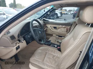 1998 BMW 7 Series with VIN WBAGF8323WDL57406, listed as a IAAI auction lot 42428227 with 93,448 mi miles and . Bid and sale history available at DreamBid. Image 5.