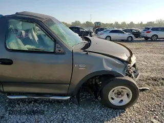 2002 Ford F-150 XL z VIN 2FTRF18W12CA41575, wystawiony jako Copart lot #75248554 z przebiegiem Nie podano mil oraz Szkoda całkowita • Salvage title. Historia ofert i sprzedaży dostępna na DreamBid. Obrazek 11.