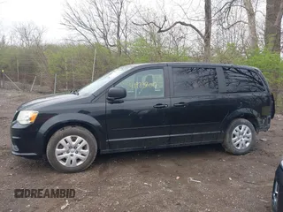 2015 Dodge Grand Caravan American Value with VIN 2C4RDGBG5FR512267, listed as a IAAI auction lot 41923200 with 154,234 mi miles and . Bid and sale history available at DreamBid. Image 14.