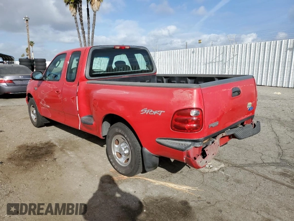 2003 Ford F-150 XL with VIN 1FTRX07213KB93777, listed as a Copart auction lot 46950285 with 176,332 mi miles and Salvage title. Bid and sale history available at DreamBid. Image 2.