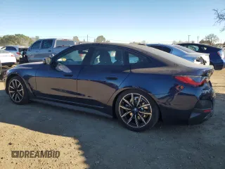2024 BMW i4 eDrive40 with VIN WBY73AW03RFS35715, listed as a Copart auction lot 87730595 with 10,811 mi miles and Salvage Title. Bid and sale history available at carsss.com. Image 2.