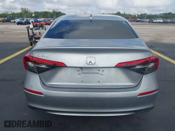 2023 Honda Civic EX z VIN 2HGFE1F79PH303727, wystawiony jako IAAI lot #42251695 z przebiegiem 21 071 mil mil oraz . Historia ofert i sprzedaży dostępna na DreamBid. Obrazek 16.