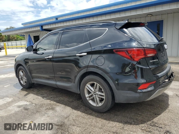 2017 Hyundai Santa Fe 2.4L with VIN 5NMZUDLB8HH048454, listed as a Copart auction lot 64727415 with 82,828 mi miles and Salvage title. Bid and sale history available at DreamBid. Image 2.