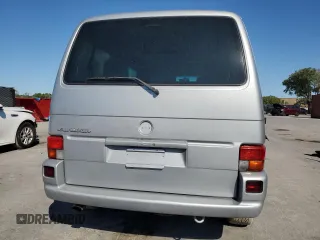2002 Volkswagen EuroVan с VIN WV2KB47012H065431, выставлен на аукционе Copart как лот 49010445 с пробегом 78 985 миль миль и Чистый • Clean title. История ставок и продаж доступна на DreamBid. Изображение 6.