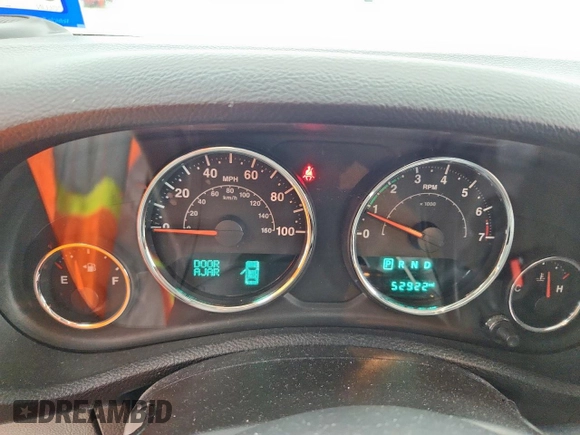 2016 Jeep Wrangler Black Bear with VIN 1C4AJWAG0GL104173, listed as a Copart auction lot 63565415 with 52,922 mi miles and Salvage title. Bid and sale history available at DreamBid. Image 9.