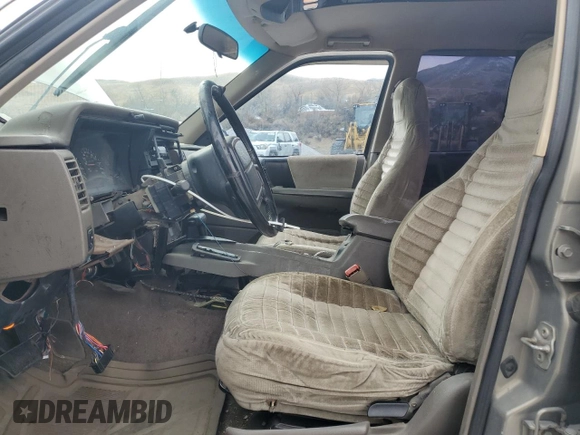 1995 Jeep Grand Cherokee Laredo with VIN 1J4GZ58S7SC743239, listed as a Copart auction lot 81717114 with 254,061 mi miles and Salvage Title. Bid and sale history available at carsss.com. Image 7.