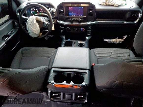 2023 Ford F-150 XL with VIN 1FTEW1CP3PKF86310, listed as a Copart auction lot 60575065 with 29,548 mi miles and Salvage title. Bid and sale history available at DreamBid. Image 8.