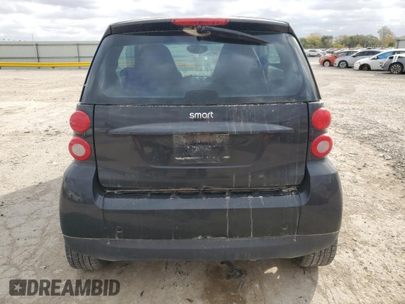 2009 Smart fortwo Pure with VIN WMEEJ31X19K267800, listed as a Copart auction lot 77392744 with 100,178 mi miles and Salvage Title. Bid and sale history available at carsss.com. Image 6.