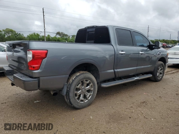 2017 Nissan Titan XD SV with VIN 1N6BA1F43HN561925, listed as a Copart auction lot 70927814 with 133,605 mi miles and Salvage Title. Bid and sale history available at carsss.com. Image 3.
