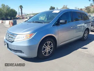 2012 Honda Odyssey EX-L with VIN 5FNRL5H69CB003067, listed as a IAAI auction lot 41862591 with 163,158 mi miles and . Bid and sale history available at carsss.com. Image 2.