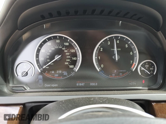 2013 BMW 7 Series 740i with VIN WBAYA6C58DC995137, listed as a Copart auction lot 75774104 with 61,847 mi miles and Salvage Title. Bid and sale history available at carsss.com. Image 9.