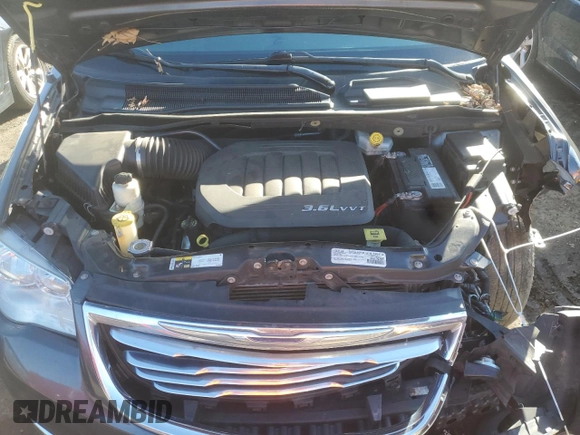 2016 Chrysler Town & Country Touring with VIN 2C4RC1BG1GR287489, listed as a Copart auction lot 46703405 with 189,371 mi miles and Salvage Title. Bid and sale history available at DreamBid. Image 12.