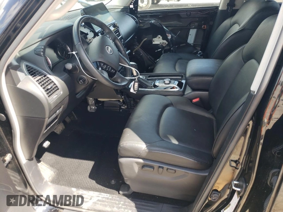 2023 Nissan Armada SV with VIN JN8AY2AC7P9180329, listed as a Copart auction lot 71796494 with 30,910 mi miles and Salvage Title. Bid and sale history available at carsss.com. Image 7.