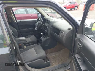 2014 Jeep Patriot Sport with VIN 1C4NJPBB6ED906017, listed as a IAAI auction lot 42097186 with 203,896 mi miles. Bid and sale history available at carsss.com. Image 5.