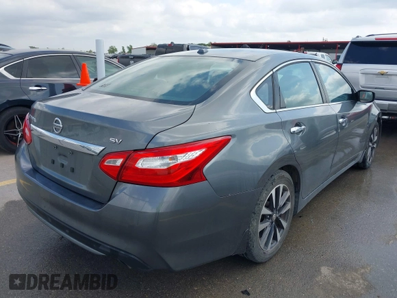 2016 Nissan Altima SV with VIN 1N4AL3AP8GC165916, listed as a IAAI auction lot 42035695 with 126,398 mi miles and . Bid and sale history available at DreamBid. Image 4.
