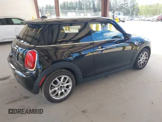 2021 MINI Hardtop Cooper with VIN WMWXR3C0XM2N93195, listed as a IAAI auction lot 42083421 with 46,269 mi miles and . Bid and sale history available at DreamBid. Image 4.