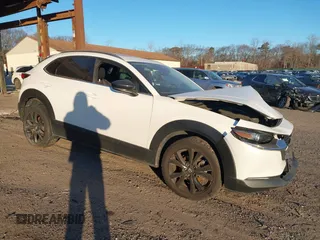 2021 Mazda CX-30 Premium with VIN 3MVDMBDY2MM236118, listed as a IAAI auction lot 41182309 with 32,286 mi miles and . Bid and sale history available at carsss.com. Image 1.