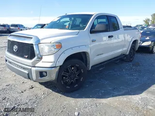 2014 Toyota Tundra 4WD Truck SR with VIN 5TFUW5F1XEX370559, listed as a IAAI auction lot 41587074 with 176,057 mi miles. Bid and sale history available at carsss.com. Image 18.