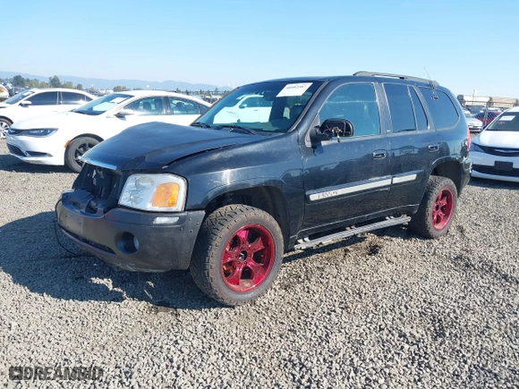 2002 GMC Envoy SLT with VIN 1GKDT13S522146661, listed as a IAAI auction lot 40502587 with 274,877 mi miles. Bid and sale history available at carsss.com. Image 18.