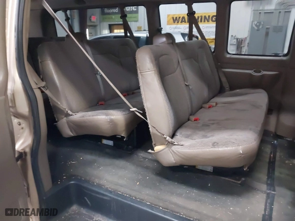 2012 Chevrolet Express Passenger 1LT with VIN 1GAZG1FAXC1127760, listed as a IAAI auction lot 41629882 with 311,110 mi miles. Bid and sale history available at carsss.com. Image 8.