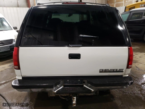 1999 Chevrolet Tahoe Z71 with VIN 1GNEK13R4XJ356365, listed as a Copart auction lot 49849285 with 187,701 mi miles and Salvage Title. Bid and sale history available at carsss.com. Image 6.