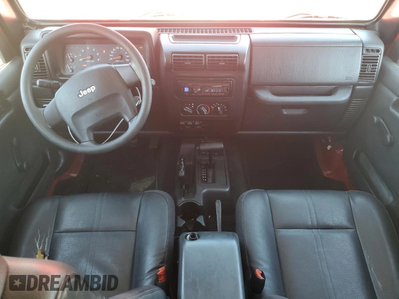 2004 Jeep Wrangler Sport with VIN 1J4FA49S24P720488, listed as a Copart auction lot 60331795 with 134,974 mi miles and Salvage title. Bid and sale history available at DreamBid. Image 8.