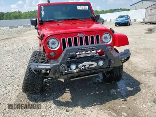 2018 Jeep Wrangler Unlimited Sahara with VIN 1C4BJWEG4JL802145, listed as a Copart auction lot 61931555 with 119,681 mi miles and Salvage title. Bid and sale history available at DreamBid. Image 14.