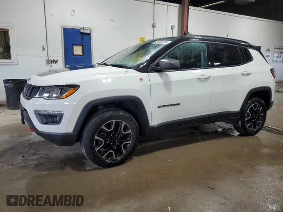 2019 Jeep Compass Trailhawk with VIN 3C4NJDDB5KT703542, listed as a Copart auction lot 54506705 with 86,178 mi miles and Salvage Title. Bid and sale history available at DreamBid. Image 1.