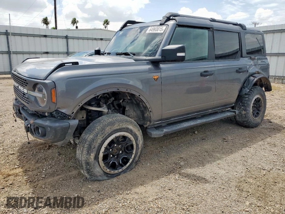 2023 Ford Bronco z VIN 1FMEE5DH1PLB80999, wystawiony jako Copart lot #64993015 z przebiegiem 36 436 mil mil oraz Szkoda całkowita • Salvage title. Historia ofert i sprzedaży dostępna na DreamBid. Obrazek 1.