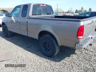 2001 Ford F-150 XL z VIN 1FTRX18WX1NA13022, wystawiony jako IAAI lot #41954491 z przebiegiem 126 284 mil mil oraz . Historia ofert i sprzedaży dostępna na DreamBid. Obrazek 3.