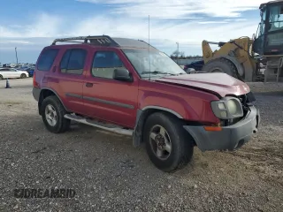 2003 Nissan Xterra XE with VIN 5N1ED28T83C672097, listed as a Copart auction lot 88880735 with 205,401 mi miles and Salvage Title. Bid and sale history available at DreamBid. Image 4.