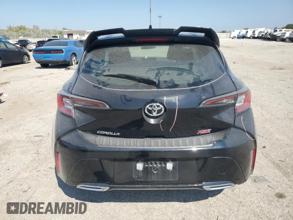 2019 Toyota Corolla Hatchback SE with VIN JTNK4RBE8K3049471, listed as a Copart auction lot 71502434 with 9,591 mi miles and Salvage Title. Bid and sale history available at carsss.com. Image 6.
