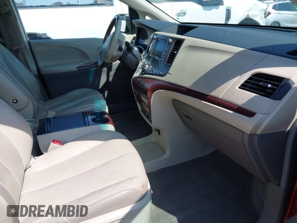 2012 Toyota Sienna XLE AAS with VIN 5TDYK3DC4CS193516, listed as a IAAI auction lot 42188284 with 239,034 mi miles. Bid and sale history available at carsss.com. Image 5.