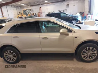 2017 Cadillac XT5 Luxury AWD z VIN 1GYKNDRS1HZ160606, wystawiony jako IAAI lot #41990425 z przebiegiem 130 822 mil mil oraz . Historia ofert i sprzedaży dostępna na DreamBid. Obrazek 13.