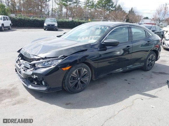 2017 Honda Civic Hatchback EX with VIN SHHFK7H5XHU405789, listed as a IAAI auction lot 41709294 with 72,089 mi miles. Bid and sale history available at carsss.com. Image 2.