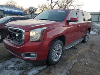 2015 GMC Yukon XL SLT with VIN 1GKS1HKC2FR290777, listed as a Copart auction lot 88466625 with 167,403 mi miles and Salvage Title. Bid and sale history available at carsss.com. Image 1.