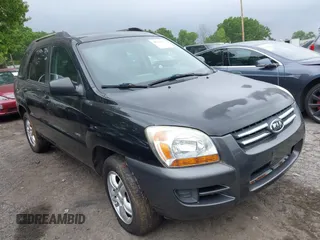 2006 Kia Sportage LX z VIN KNDJE723967160500, wystawiony jako IAAI lot #42133351 z przebiegiem 165 444 mil mil oraz . Historia ofert i sprzedaży dostępna na DreamBid. Obrazek 1.