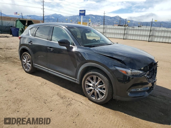 2020 Mazda CX-5 Grand Touring with VIN JM3KFBDMXL1735154, listed as a Copart auction lot 49313585 with 82,750 mi miles and Salvage Title. Bid and sale history available at DreamBid. Image 4.