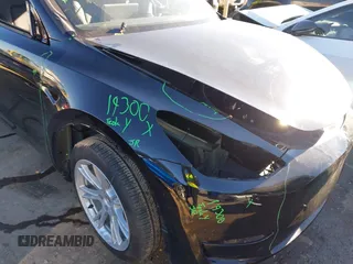 2024 Tesla Model Y Long Range with VIN 7SAYGDEE6RA276983, listed as a IAAI auction lot 41614141 with 4,472 mi miles and . Bid and sale history available at DreamBid. Image 20.