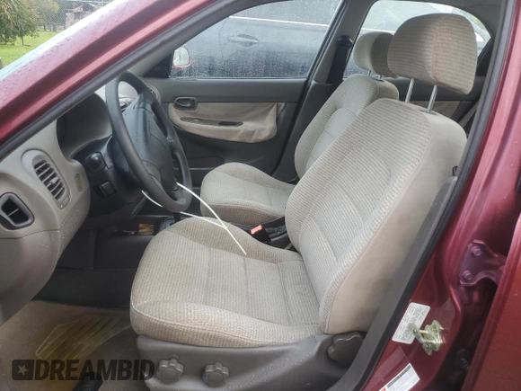 1999 Daewoo Nubira CDX z VIN KLAJB52Z5XK256700, wystawiony jako Copart lot #75085934 z przebiegiem Nie podano mil oraz Szkody całkowita. Historia ofert i sprzedaży dostępna na DreamBid. Obrazek 7.