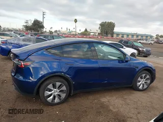 2023 Tesla Model Y Long Range with VIN 7SAYGDEE6PF947827, listed as a IAAI auction lot 41443524 with 12,381 mi miles and . Bid and sale history available at DreamBid. Image 13.