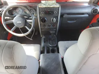 2008 Jeep Wrangler Unlimited X with VIN 1J4GA39138L615915, listed as a Copart auction lot 52391675 with 187,057 mi miles and Salvage Title. Bid and sale history available at carsss.com. Image 8.