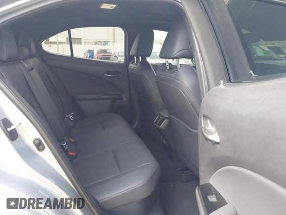 2023 Lexus UX 250h Premium z VIN JTHP6JBH5P2145912, wystawiony jako IAAI lot #42401353 z przebiegiem 14 252 mil mil oraz . Historia ofert i sprzedaży dostępna na DreamBid. Obrazek 8.