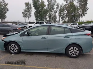 2017 Toyota Prius Two with VIN JTDKARFU7H3052594, listed as a IAAI auction lot 42035969 with 50,789 mi miles and . Bid and sale history available at DreamBid. Image 14.