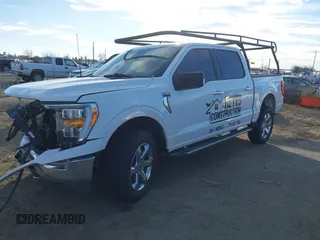 2021 Ford F-150 XL z VIN 1FTFW1E84MFB69972, wystawiony jako IAAI lot #41294390 z przebiegiem 60 336 mil mil oraz . Historia ofert i sprzedaży dostępna na DreamBid. Obrazek 2.