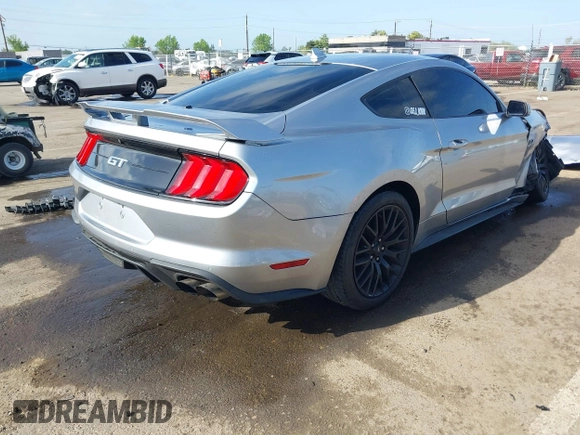 2021 Ford Mustang GT z VIN 1FA6P8CF3M5117977, wystawiony jako IAAI lot #42100989 z przebiegiem 13 557 mil mil oraz . Historia ofert i sprzedaży dostępna na DreamBid. Obrazek 4.