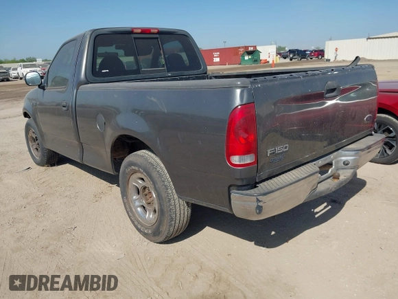 2003 Ford F-150 XL with VIN 1FTRF17273NB64646, listed as a IAAI auction lot 41986850 with 180,601 mi miles and . Bid and sale history available at DreamBid. Image 3.