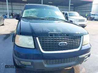 2004 Ford Expedition Eddie Bauer with VIN 1FMPU17L54LA74068, listed as a IAAI auction lot 41974666 with 292,308 mi miles. Bid and sale history available at carsss.com. Image 6.