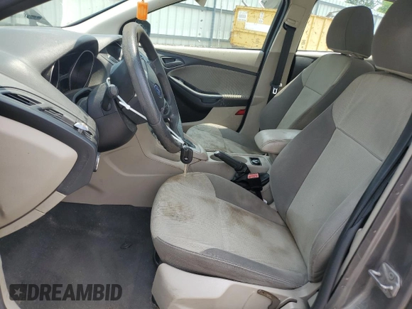 2012 Ford Focus SE z VIN 1FAHP3F22CL431070, wystawiony jako Copart lot #59569925 z przebiegiem 222 295 mil mil oraz Szkoda całkowita • Salvage title. Historia ofert i sprzedaży dostępna na DreamBid. Obrazek 7.
