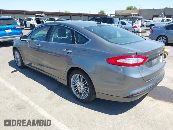 2014 Ford Fusion SE Hybrid with VIN 3FA6P0LU5ER393530, listed as a IAAI auction lot 42478440 with 93,728 mi miles and . Bid and sale history available at DreamBid. Image 3.